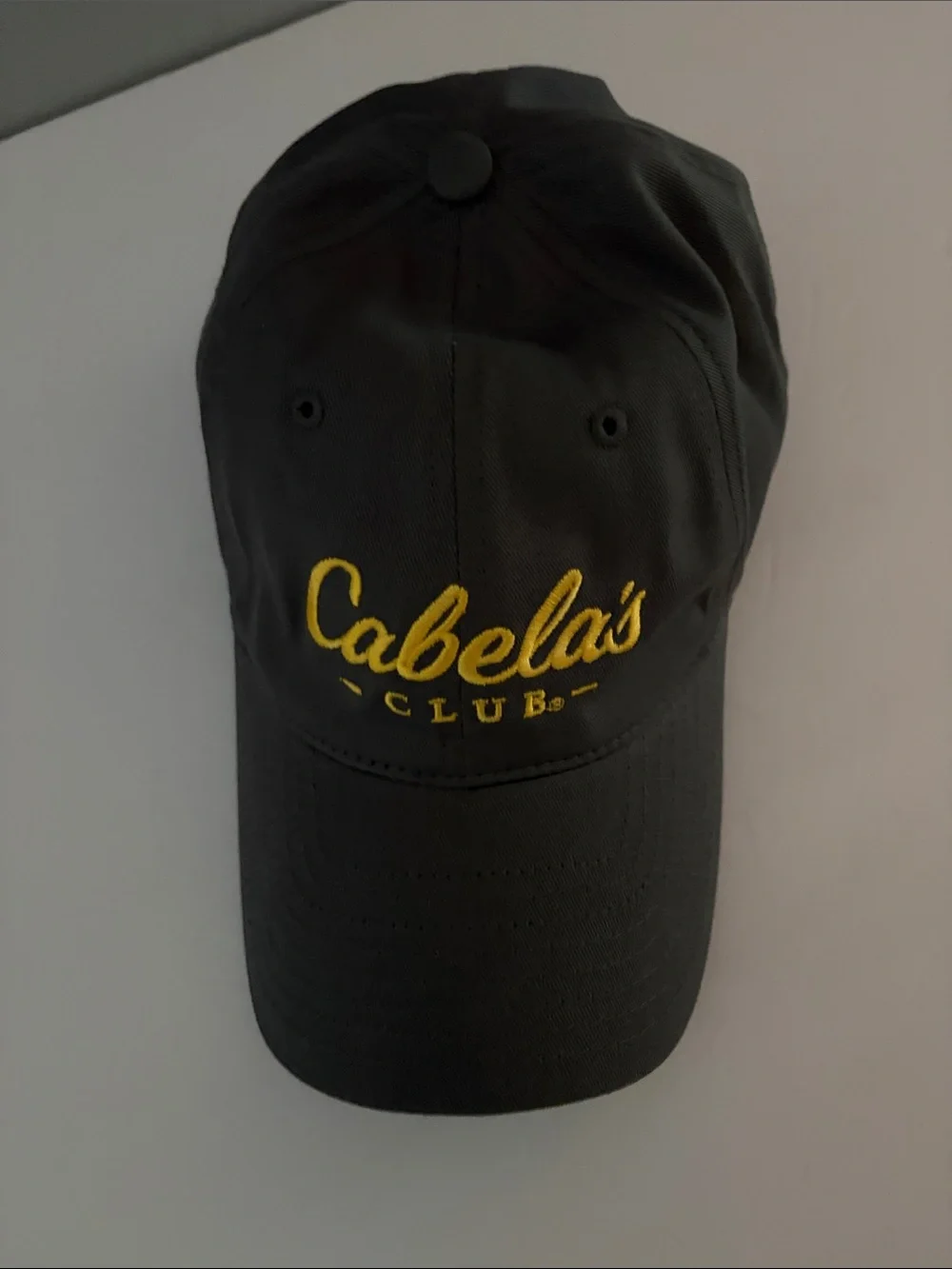 Cabela's Black Baseball Cap with Yellow Script Logo